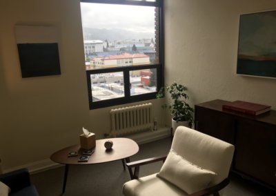 our office chair in front of window office a